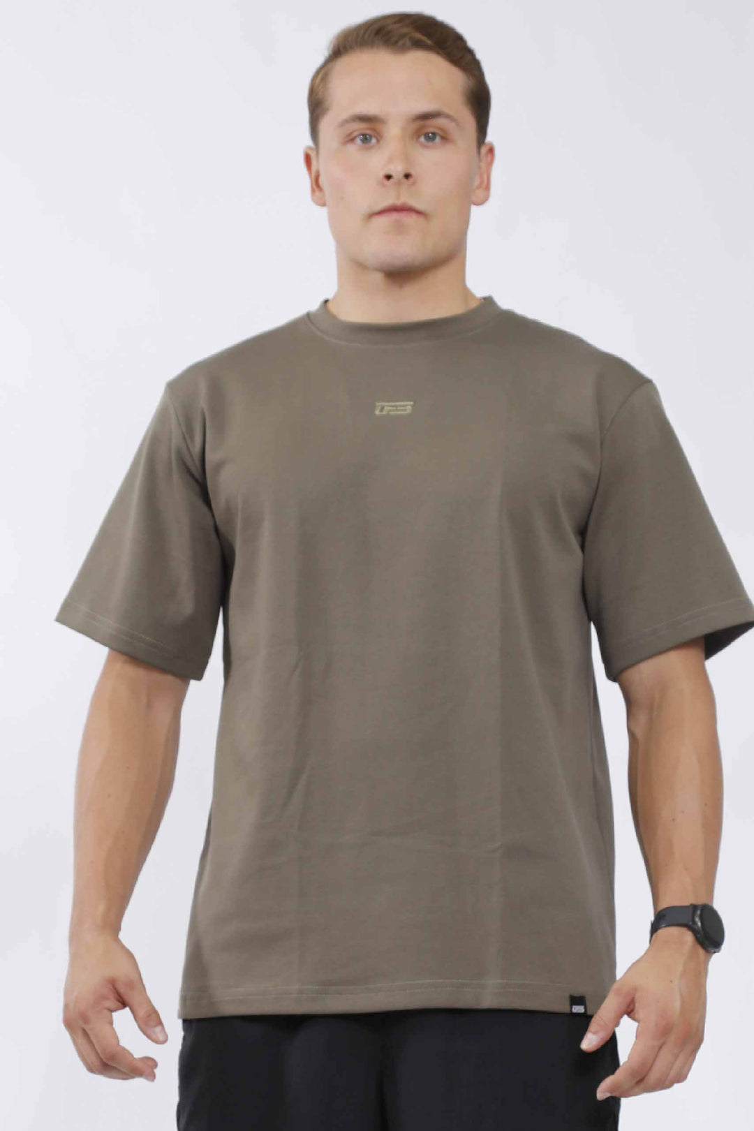 Camisa oversize hombre verde oliva – UF Sport (foto 1 de 3)