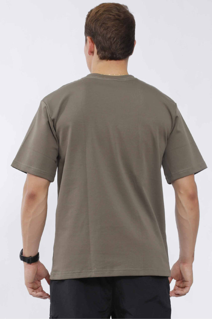 Camisa oversize hombre verde oliva – UF Sport (foto 3 de 3)
