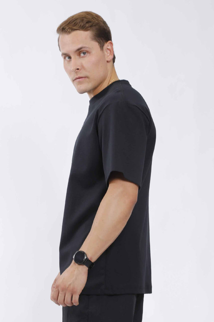 Camisa oversize hombre negra – UF Sport (foto 2 de 3)