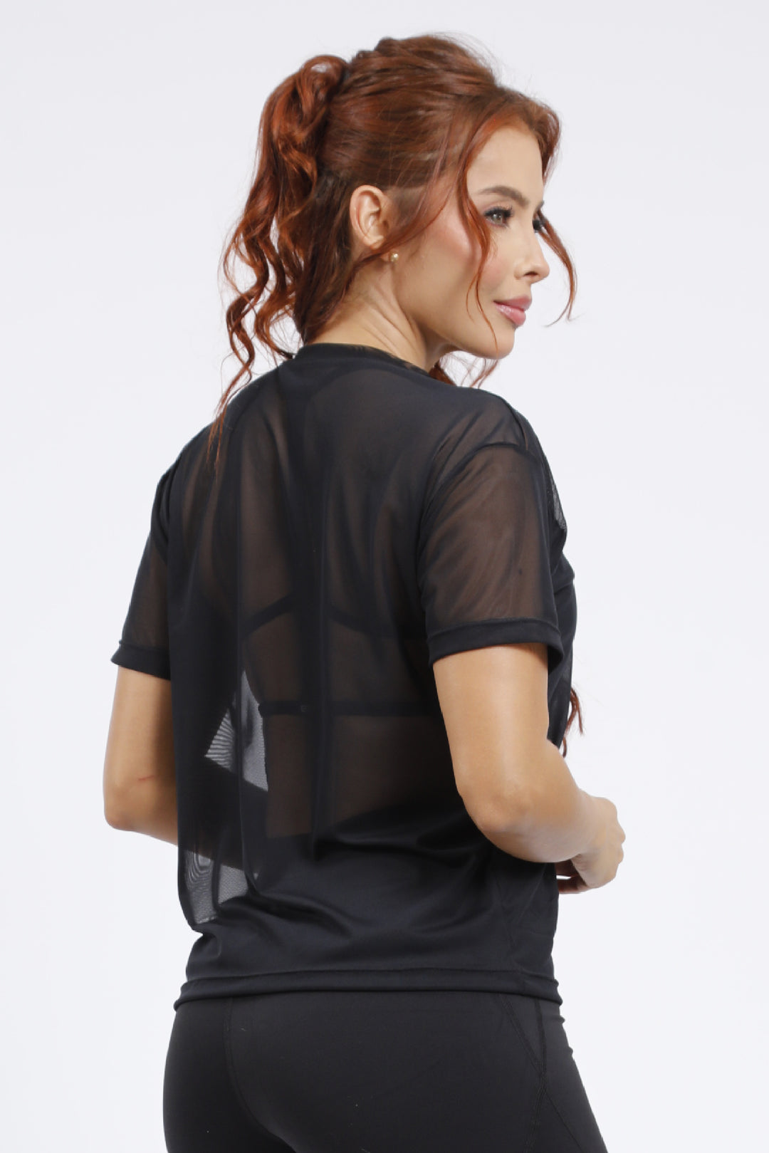 Blusa deportiva en malla negra BL-052N