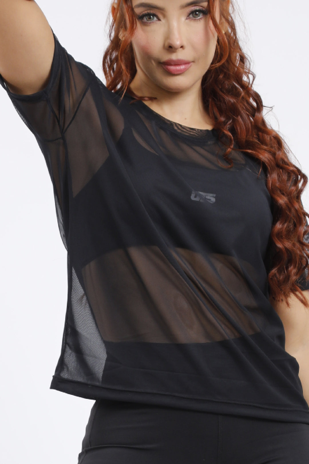 Blusa deportiva en malla negra BL-052N